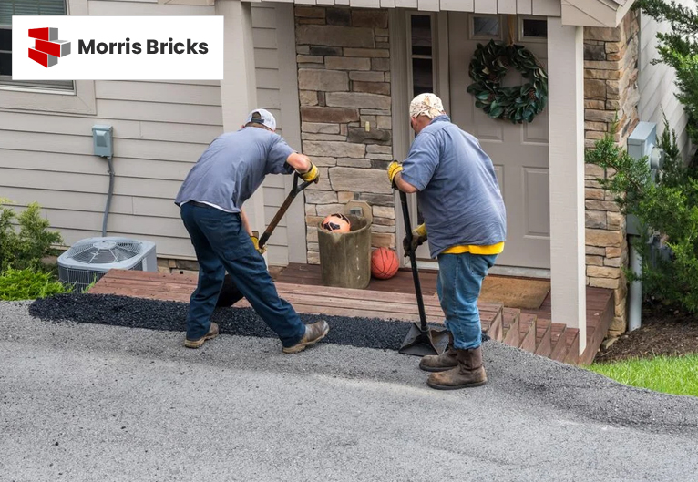 Applying Sealant on Asphalt Driveway